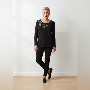 Chico’s jersey style top with rhinestones. Size: 0 / US 4